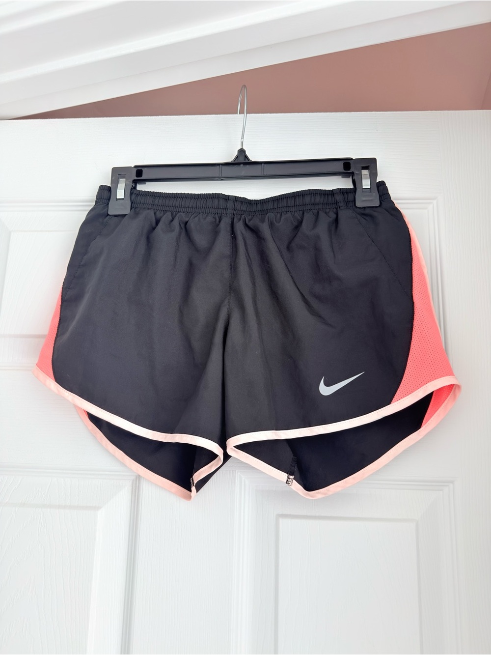 Nike Black Athletic Shorts with Coral Accent